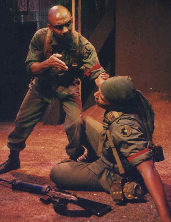 Ty, as Sgt. Master Cobb, threatens his sidekick Pvt. Maurice Briscoe. (Portrayed by Layon)